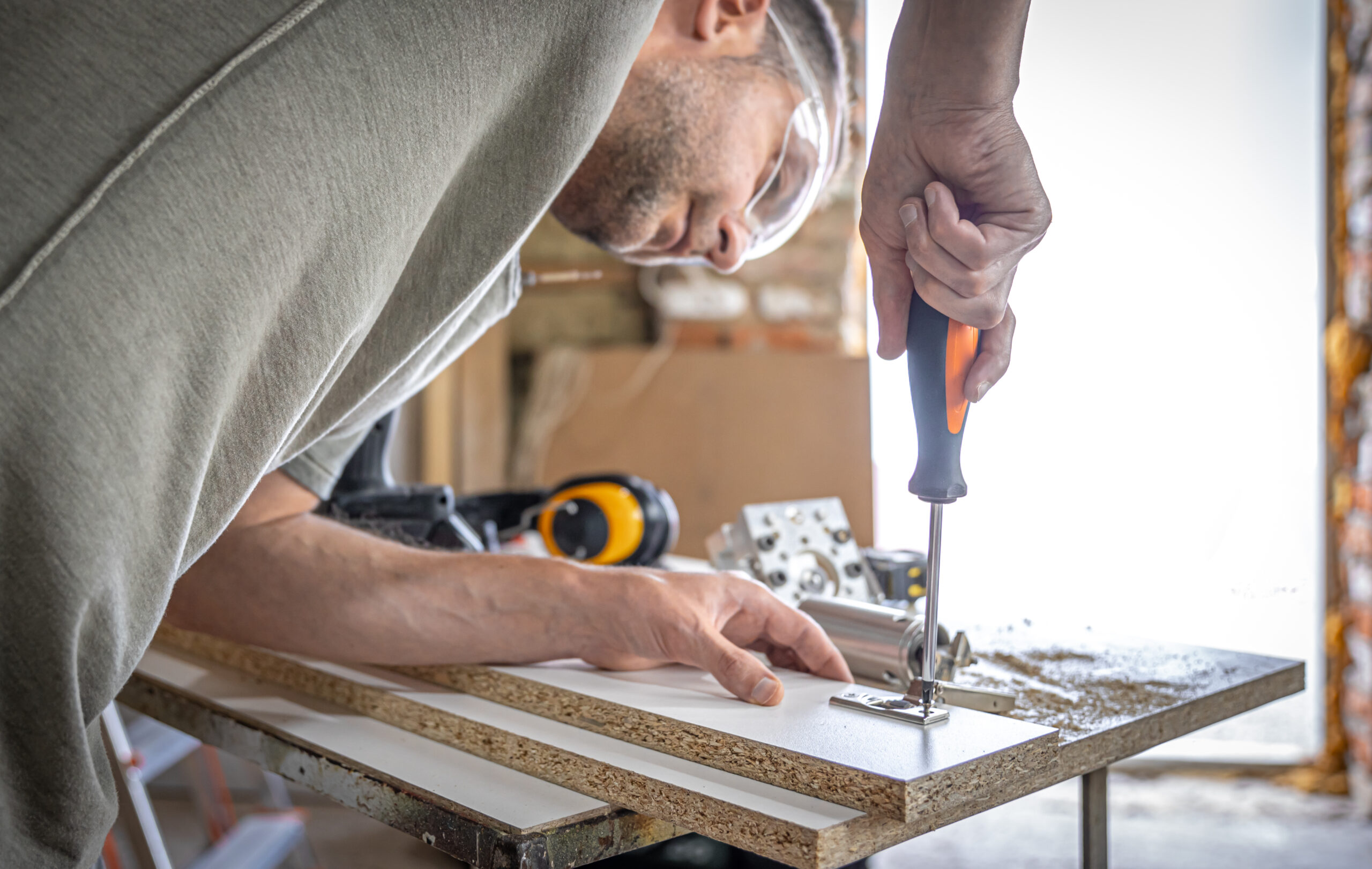 man repairing a counter